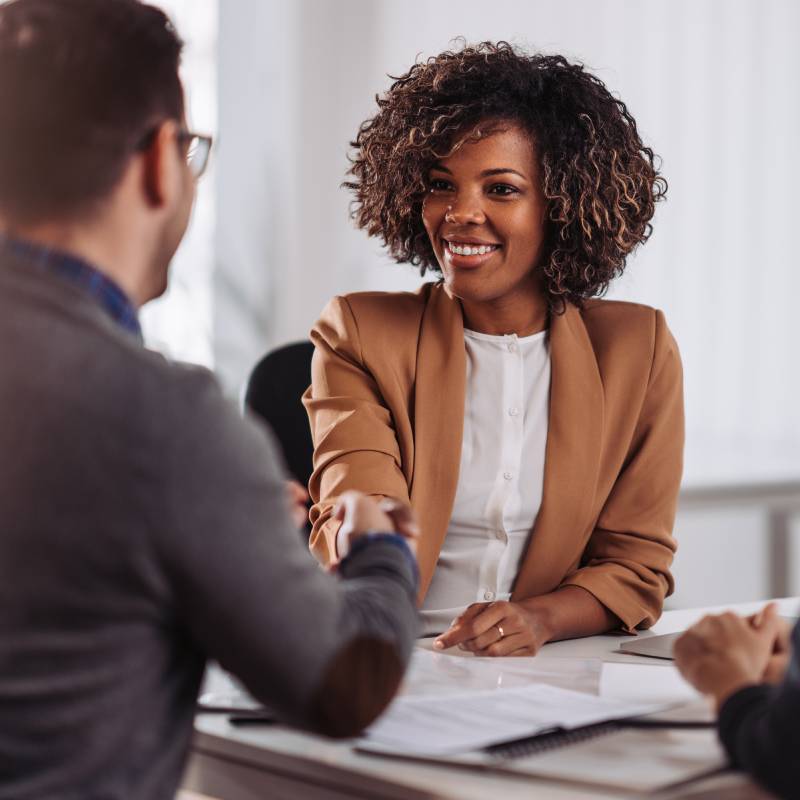 Business people shaking hands after meeting